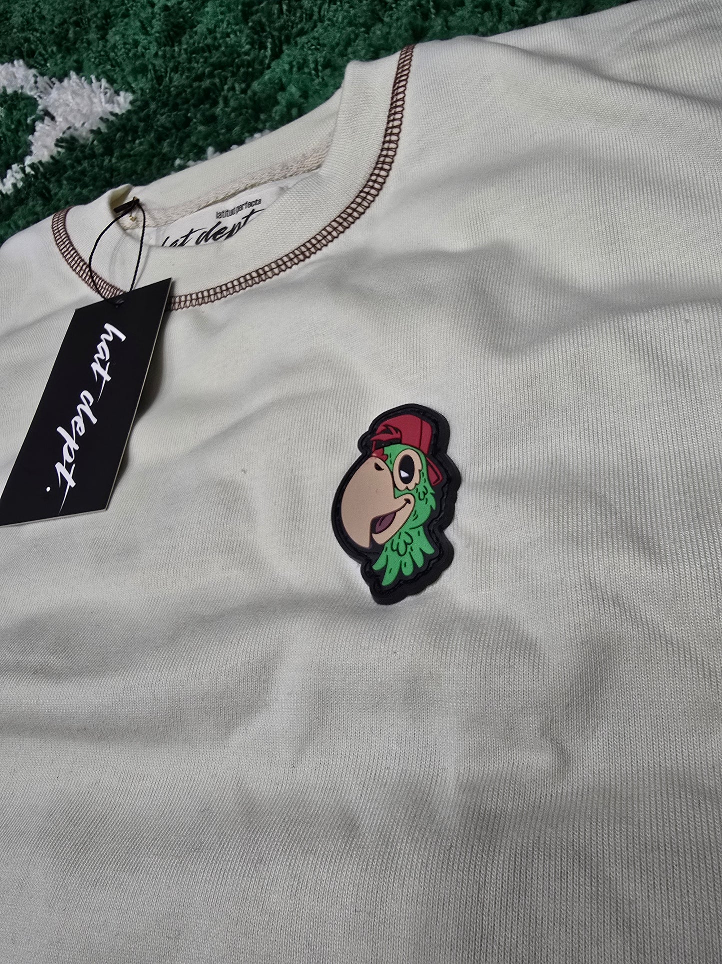 Hat Dept.🦜Logo tee